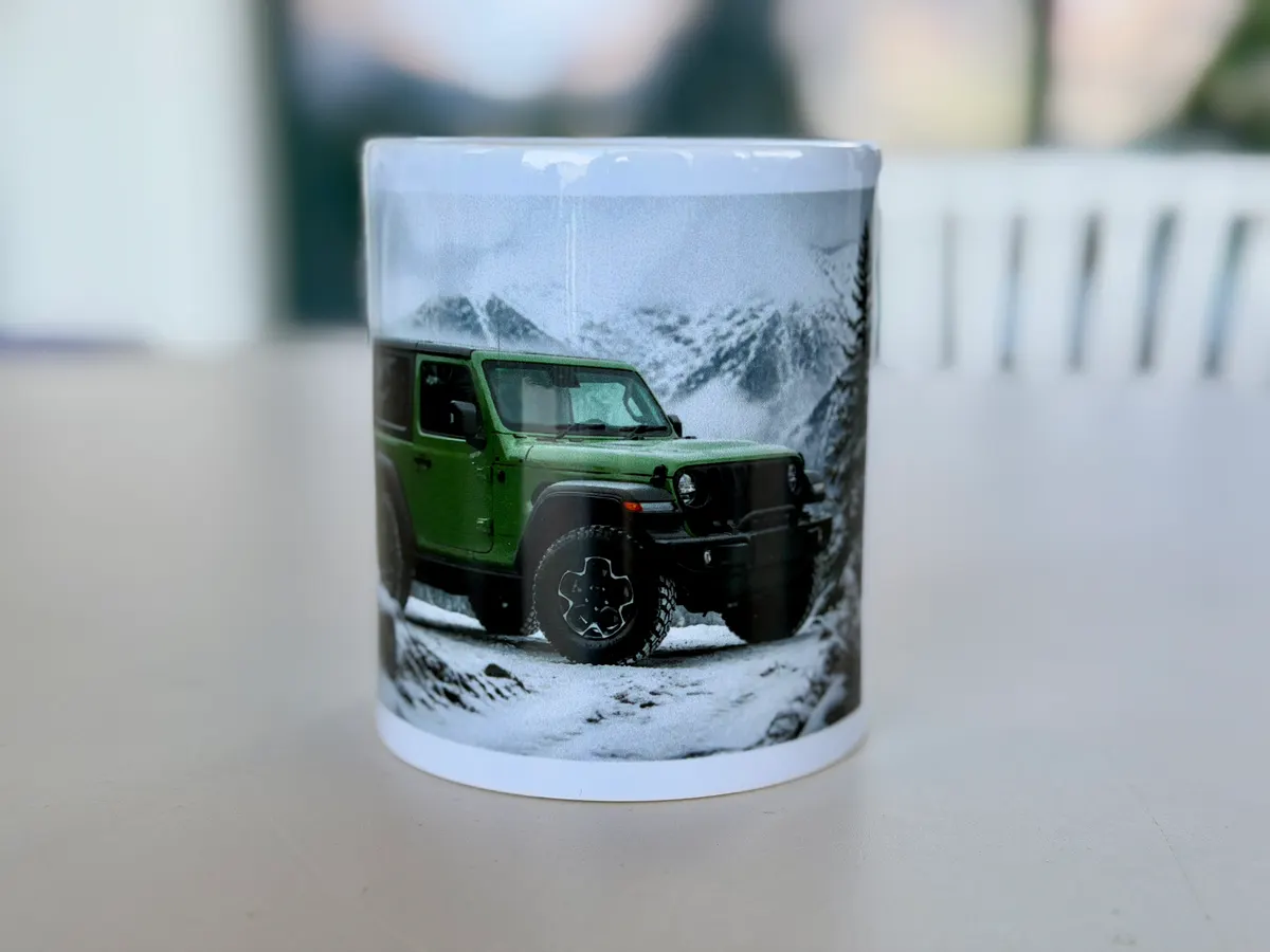 White 11oz ceramic mug printed with a customer Jeep render