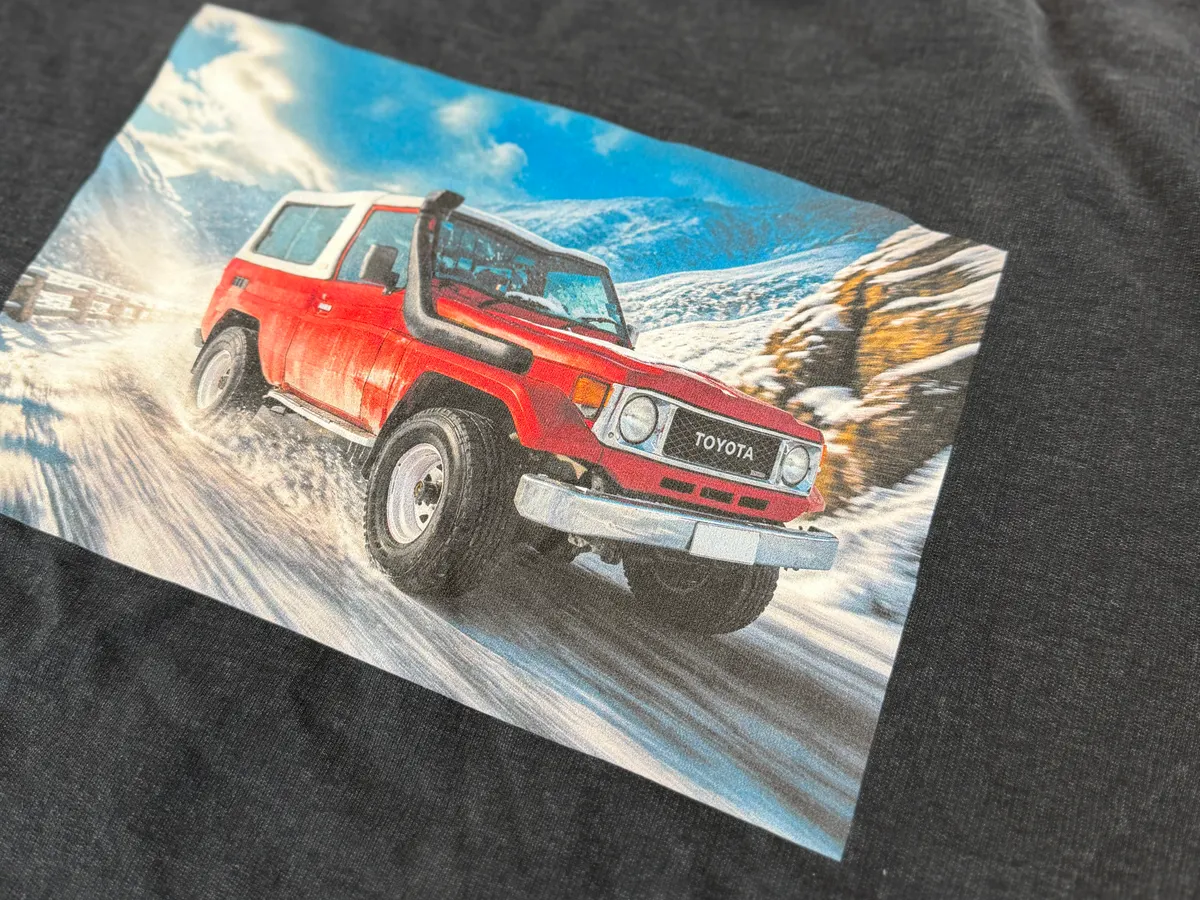 Black tee printed with a customer Land Cruiser render